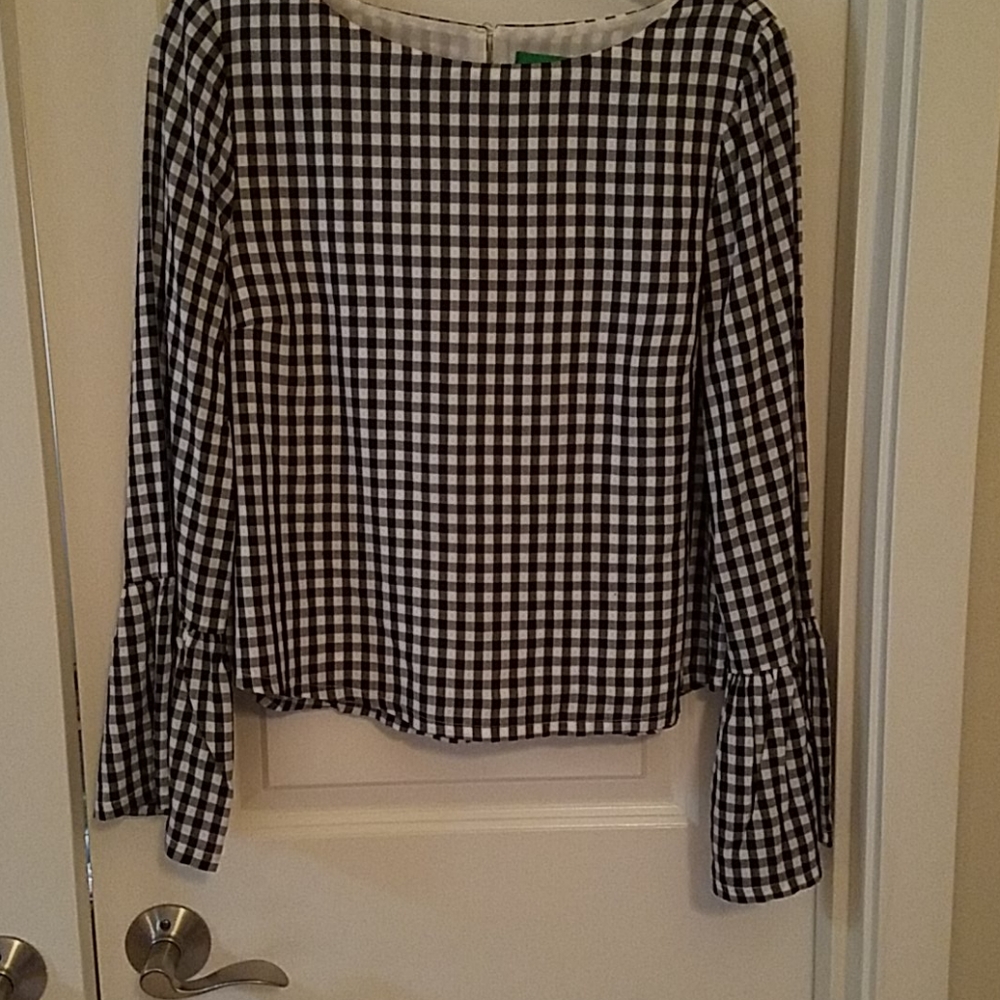 Black and white check blouse with button closure